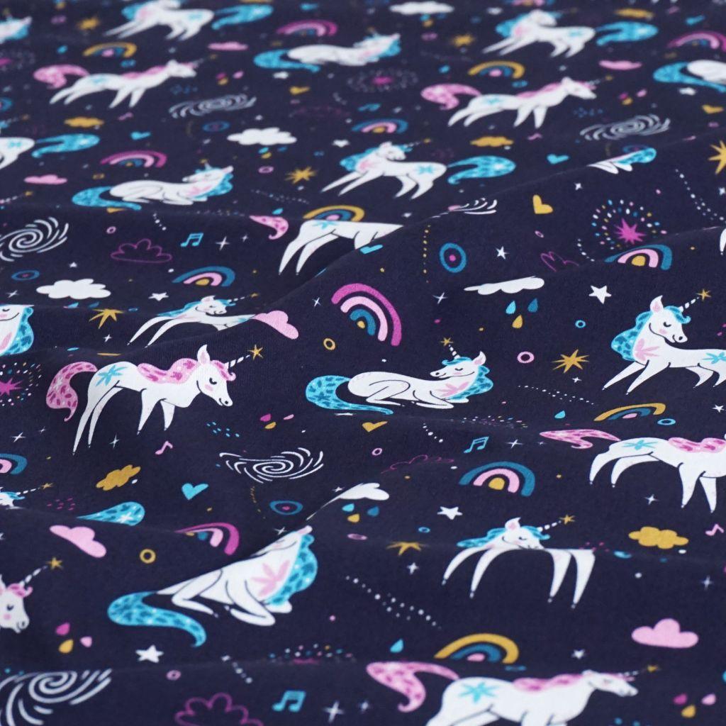 Baumwollstoff Motivdruck Einhorn Regenbogen dunkelblau rosa